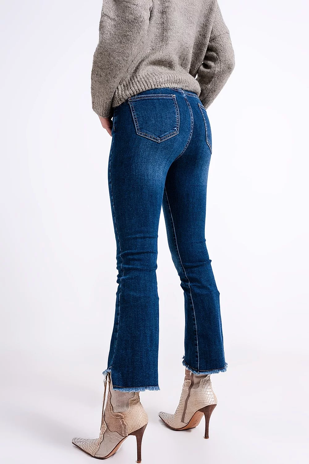 High Waisted Jeans With Asymmetrical Hem